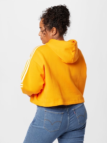 ADIDAS ORIGINALS - Sweatshirt em laranja