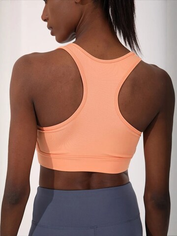 Tommy Life Sport top 'Aktive Oberteile' - narancs