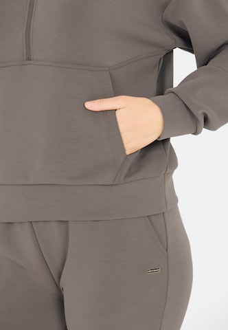 Athlecia Sports sweatshirt 'Jillnana' in Brown