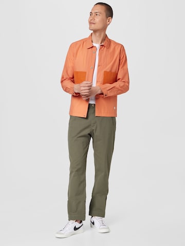 FolkPrijelazna jakna 'STACK' - narančasta boja