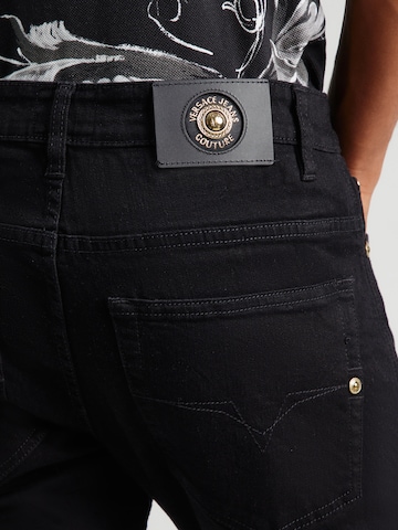 Slimfit Jeans 'Dundee' di Versace Jeans Couture in nero