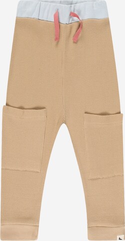 Turtledove London Tapered Pants in Brown: front