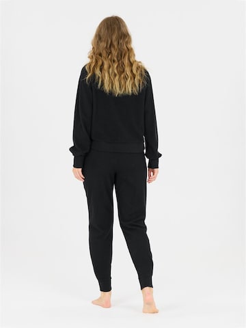 Regular Pantalon de sport 'Hecey' Athlecia en noir