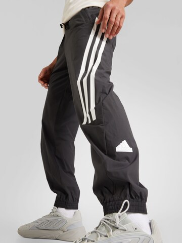 Tapered Pantaloni sport de la ADIDAS SPORTSWEAR pe negru