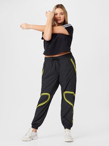 Tapered Pantaloni sportivi 'Truepace ' di ADIDAS BY STELLA MCCARTNEY in nero