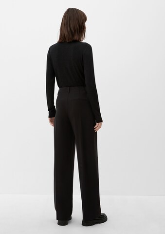 Wide leg Pantaloni con pieghe di s.Oliver in nero