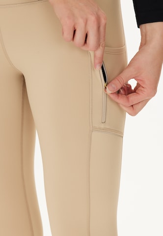 ENDURANCE Skinny Urheiluhousut 'Thadea' värissä beige