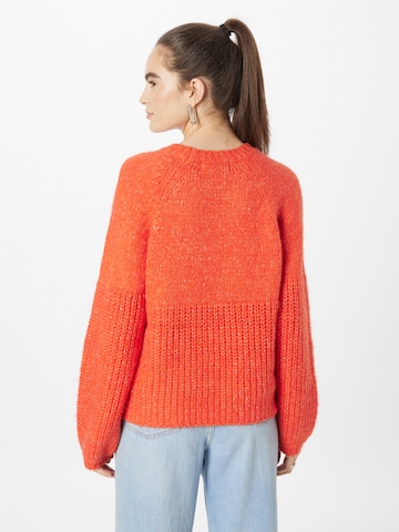 Moves Pullover i orange