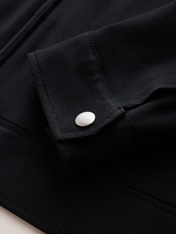 Next Between-Season Jacket 'Motionflex' in Black