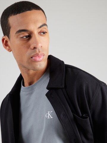 Calvin Klein Jeans Majica 'ESSENTIAL' | siva barva