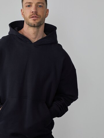 DAN FOX APPAREL Sweatshirt 'Dean' i svart