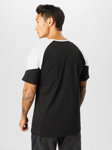 T-Shirt fonctionnel 'Iconic MCS' PUMA en noir
