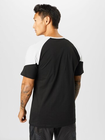 PUMA T-Shirt 'Iconic MCS' in Schwarz