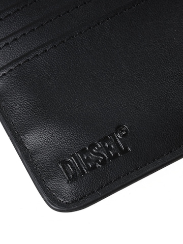 DIESEL Denarnica 'HISSU BI-FOLD COIN S' | črna barva