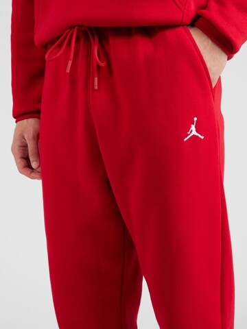 Jordan Tapered Housut 'Essential' värissä punainen