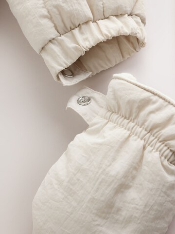 Next Overall in Beige