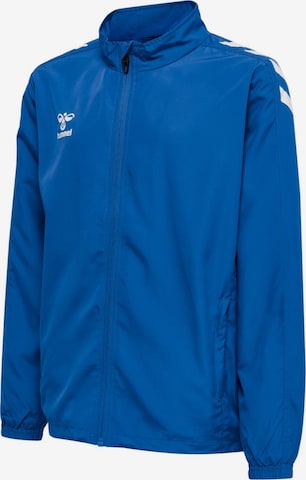 Veste de sport 'hmlCORE XK MICRO ZIP JACKET KIDS' Hummel en bleu : devant