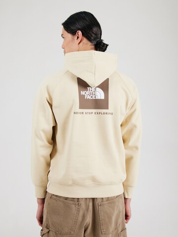 Sweat-shirt 'REDBOX' THE NORTH FACE en beige : devant