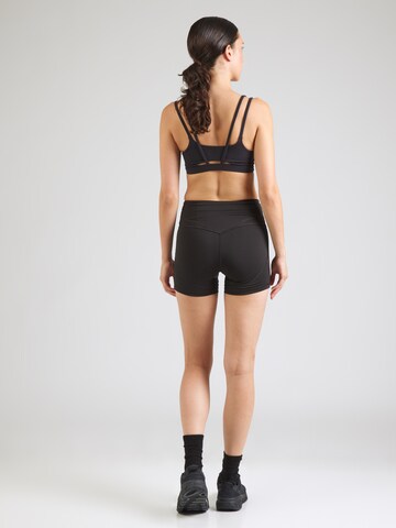 PUMASkinny Sportske hlače 'Shape' - crna boja