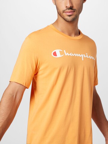 Maglietta 'Legacy American Classics' di Champion Authentic Athletic Apparel in arancione