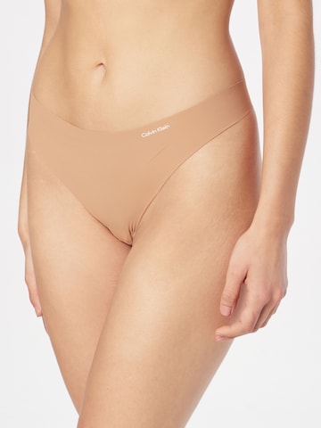 Calvin Klein Underwear Thong in Beige, Nude, Cognac, Dark Brown