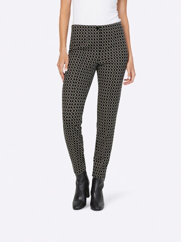 Coupe slim Pantalon heine en noir : devant