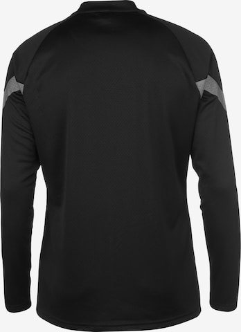 PUMA Trainingsjacke in Schwarz