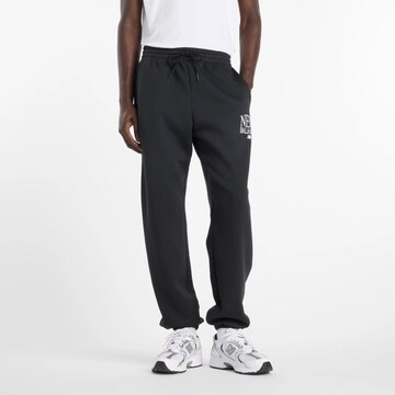 Regular Pantalon fonctionnel 'Reimagined' new balance en noir : devant