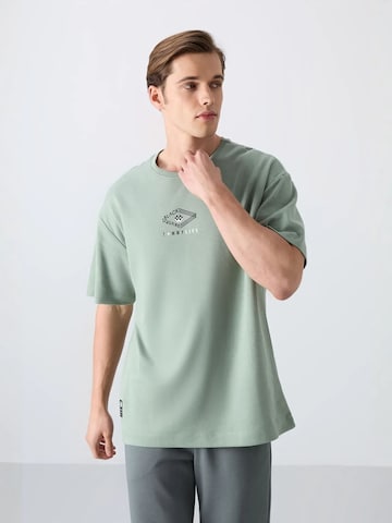 Maglietta di Tommy Life in verde: frontale