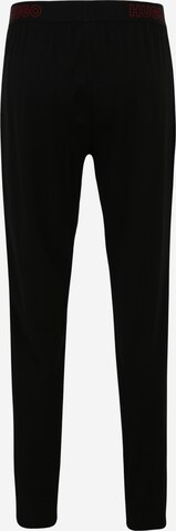 HUGO Pyžamové kalhoty 'Unite' – černá