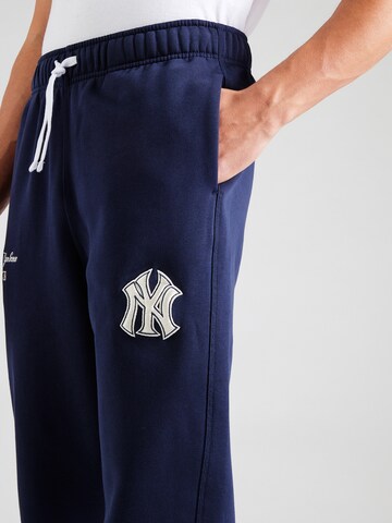 Champion Authentic Athletic Apparel Tapered Hose in Blau