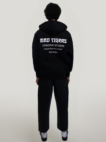 MAD TIGERS Sweatshirt 'Creative Studios' in Zwart