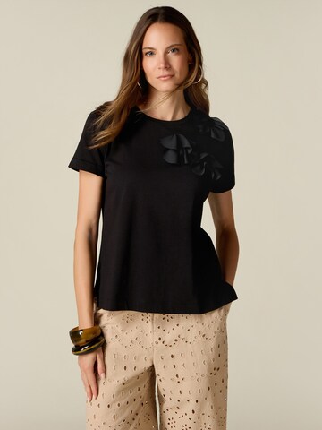 oltre - Camiseta en negro: frente