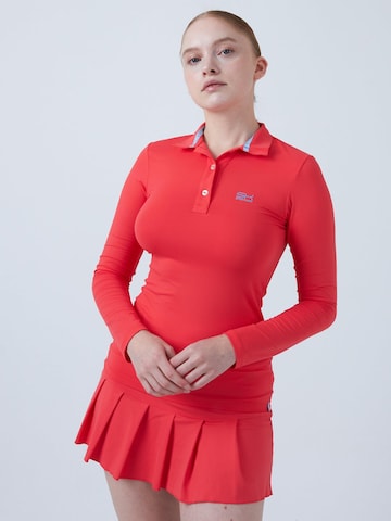 SPORTKIND Performance Shirt 'Poloshirt Langarm' in Orange: front