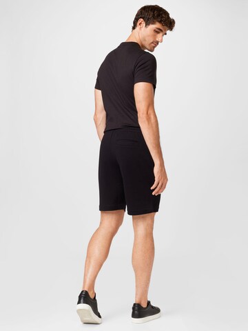 regular Pantaloni di LACOSTE in nero