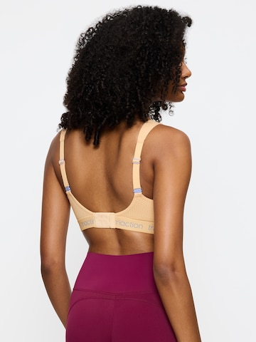 Invisible Soutien-gorge de sport 'Triaction Energy Lite' TRIUMPH en orange