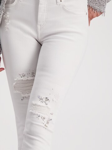 Skinny Jeans di monari in bianco