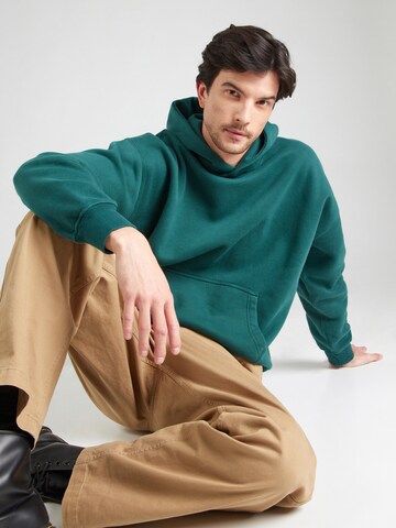 Abercrombie & Fitch Bluzka sportowa 'ESSENTIAL POPOVER' w kolorze zielony: przód
