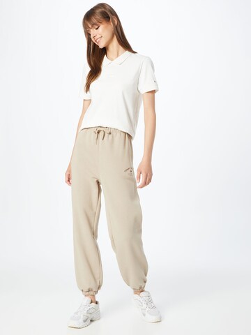 Effilé Pantalon de sport TOMMY HILFIGER en beige