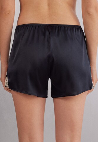 INTIMISSIMI Pyjamahose 'PRETTY FLOWERS' in Schwarz