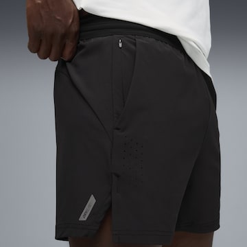 PUMA Regular Sportshorts 'Pwrmode' in Schwarz