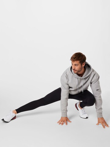 Reebok Спортен блузон в сиво