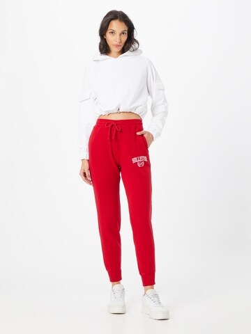 HOLLISTER - Tapered Pantalón en rojo