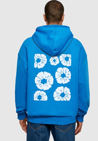 Mister Tee Bluzka sportowa 'Bold Flowers' w kolorze niebieski: przód