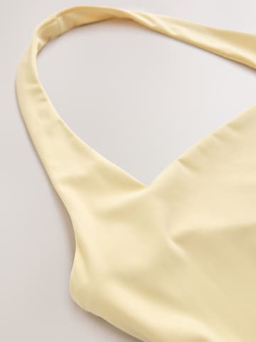 Next - Top 'N. Premium' em amarelo
