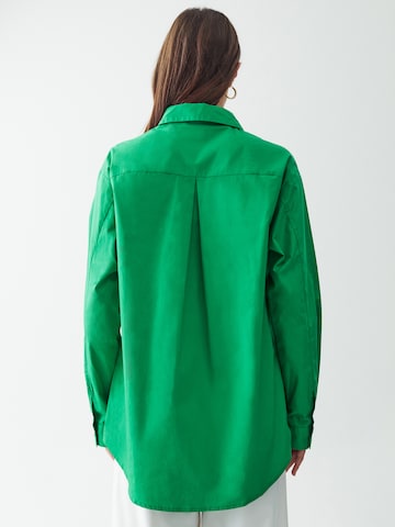 Calli - Blusa em verde