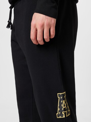 ADIDAS SPORTSWEAR Tapered Workout Pants 'All Szn X Logomania' in Black