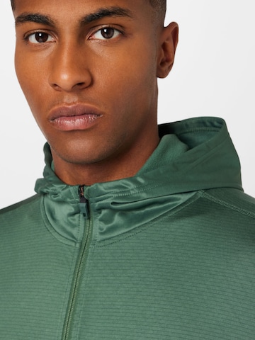 ADIDAS SPORTSWEAR Спортна жилетка с качулка 'Workout Warm ' в зелено