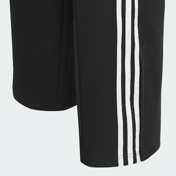 Loosefit Pantalon de sport '2IN1 FIREBIRD LOOSE LACE SKIRT' ADIDAS ORIGINALS en noir
