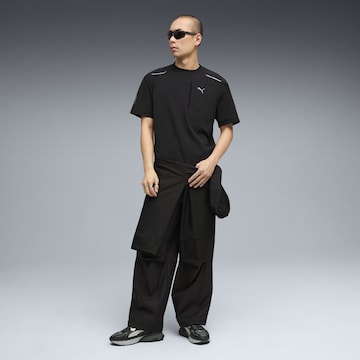 PUMA Functioneel shirt 'Pumatech' in Zwart